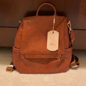 Gluci faux leather backpack purse !